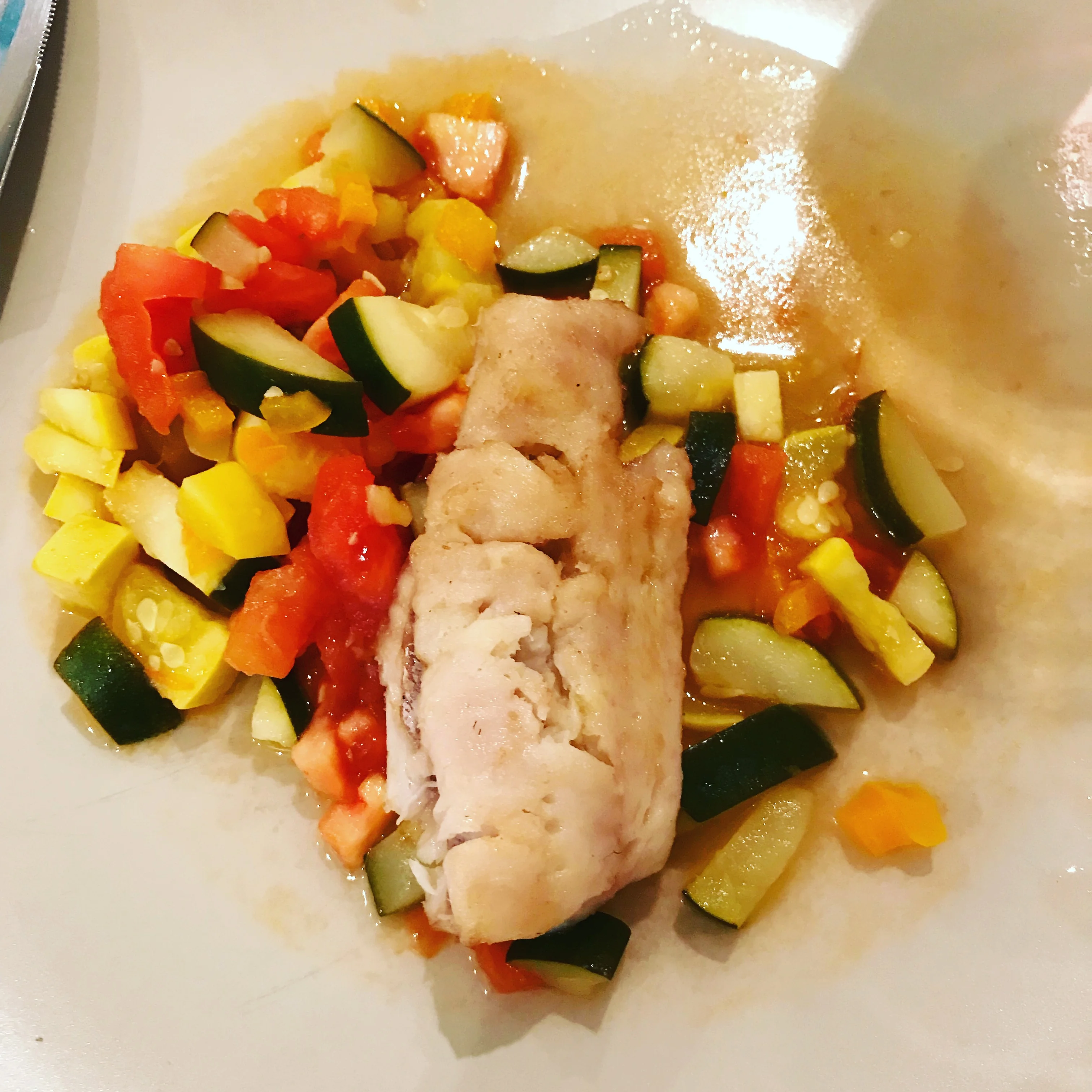 Olive Oil Poached Hake with Sauteed Zucchini and Tomatoes